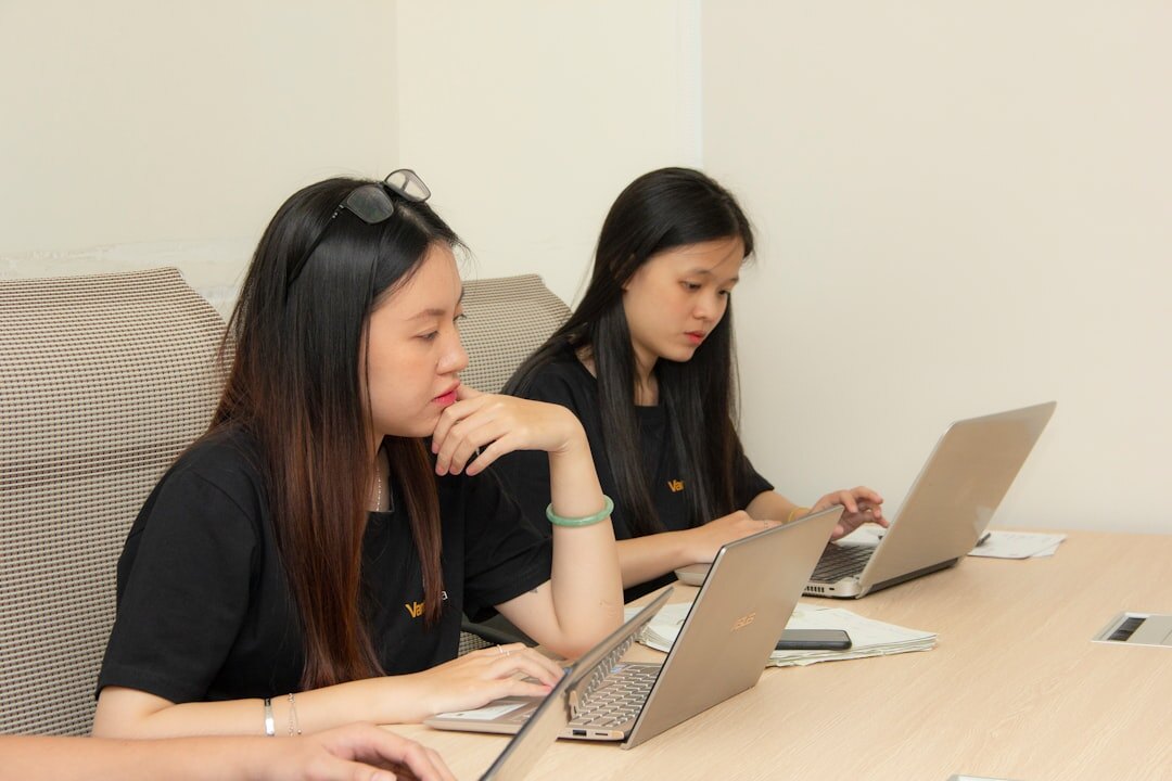 Children learning to code on computers