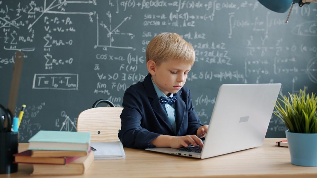 Student working on a tablet in modern school